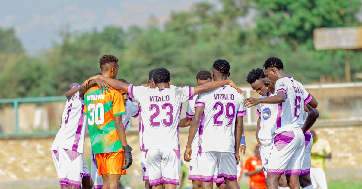 Youth soccer team huddle